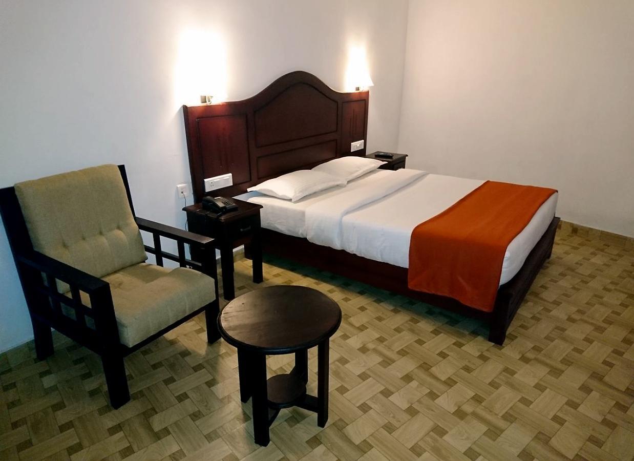 Natura Inn Munnar Buitenkant foto