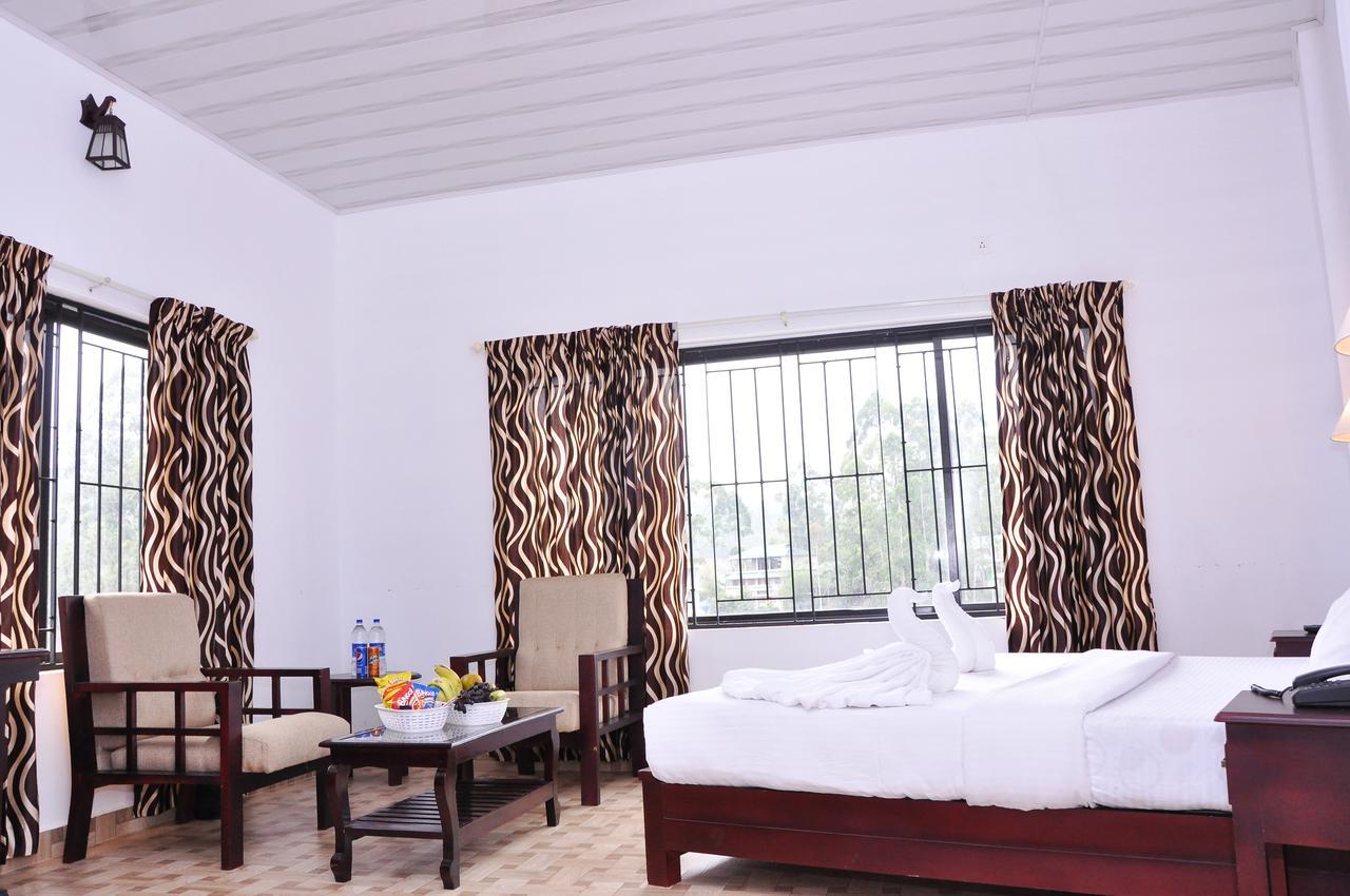 Natura Inn Munnar Buitenkant foto